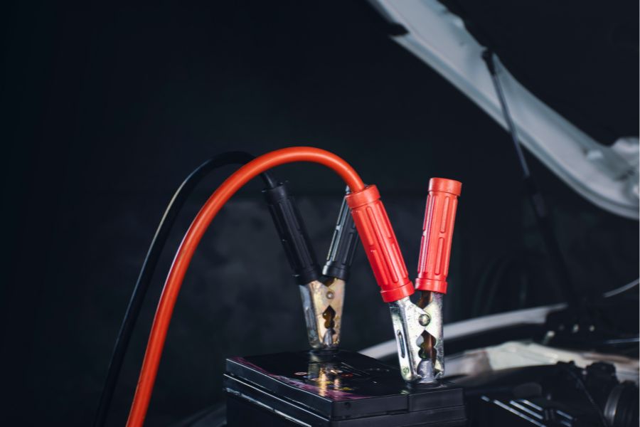 Charger cable clamping to the car battery