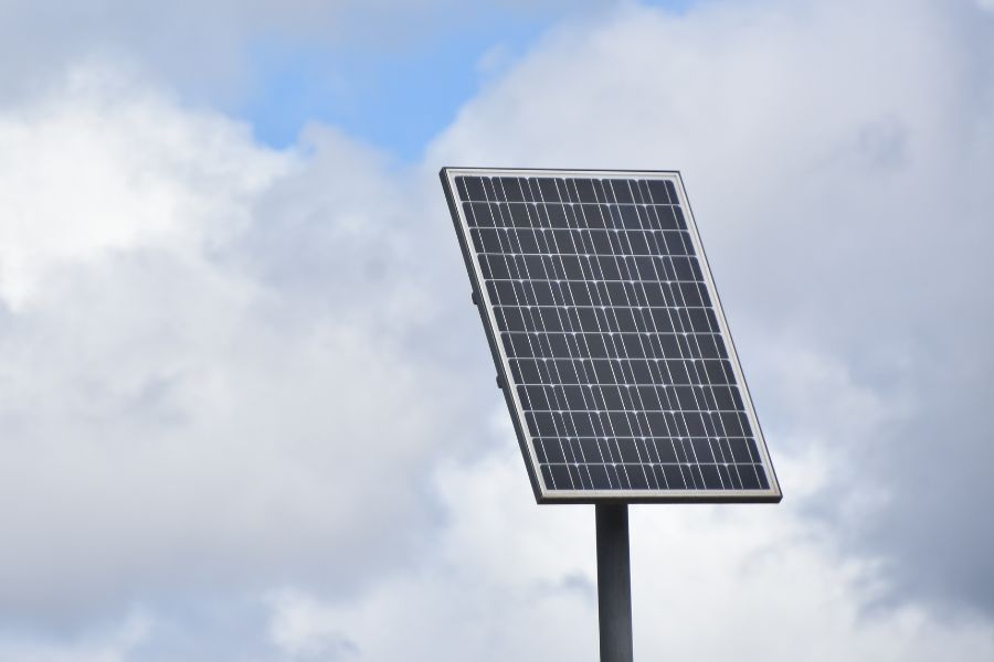 A solar panel against cloudy sky