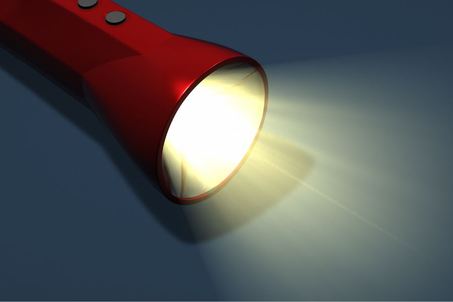 3D illustration of a flashlight with a light beam