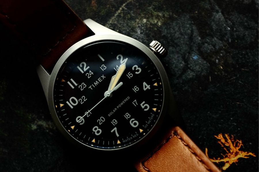 Eco-friendly solar-powered watch on dark surface